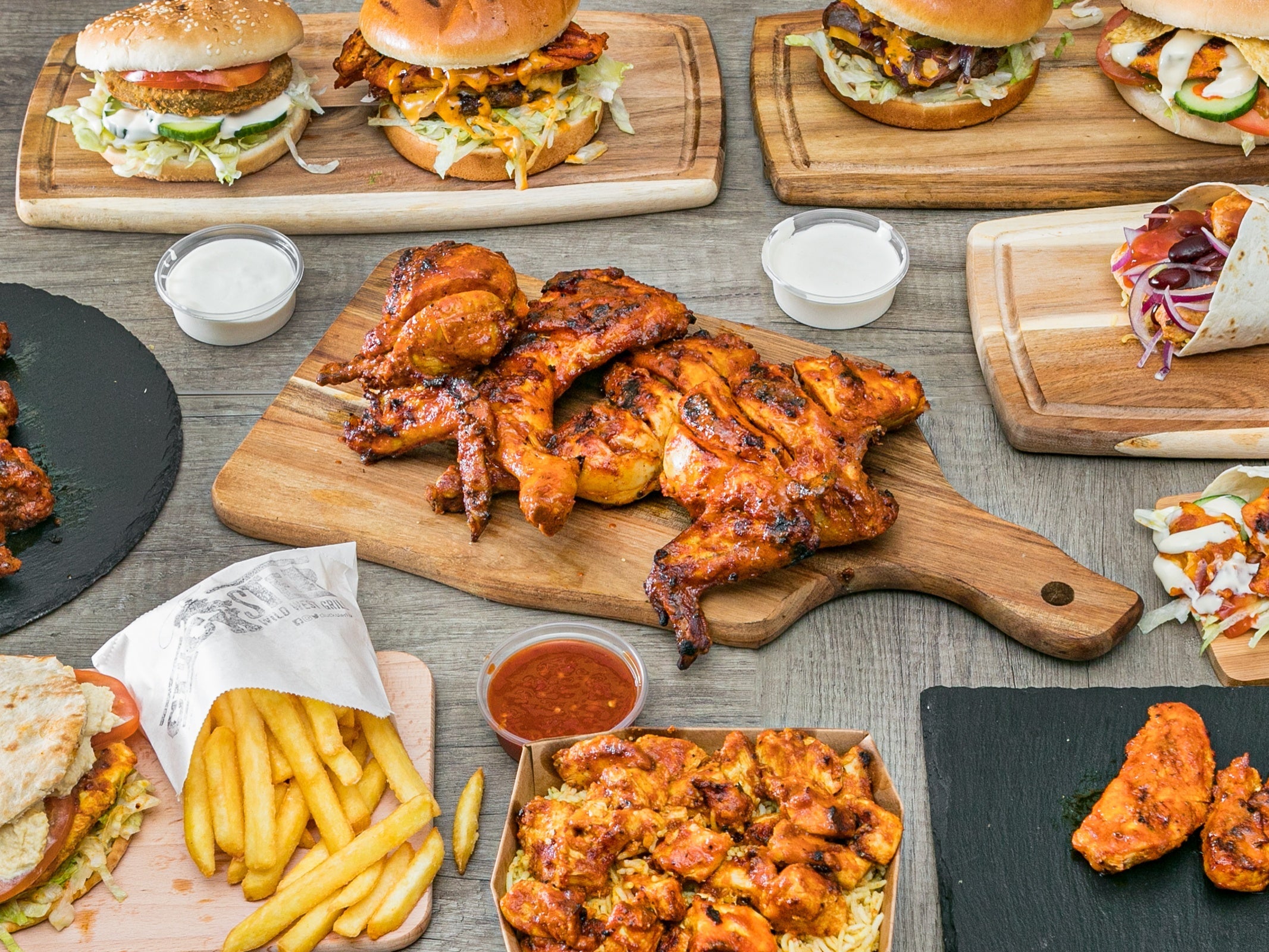 Grilled chicken, chips, rice and sides.